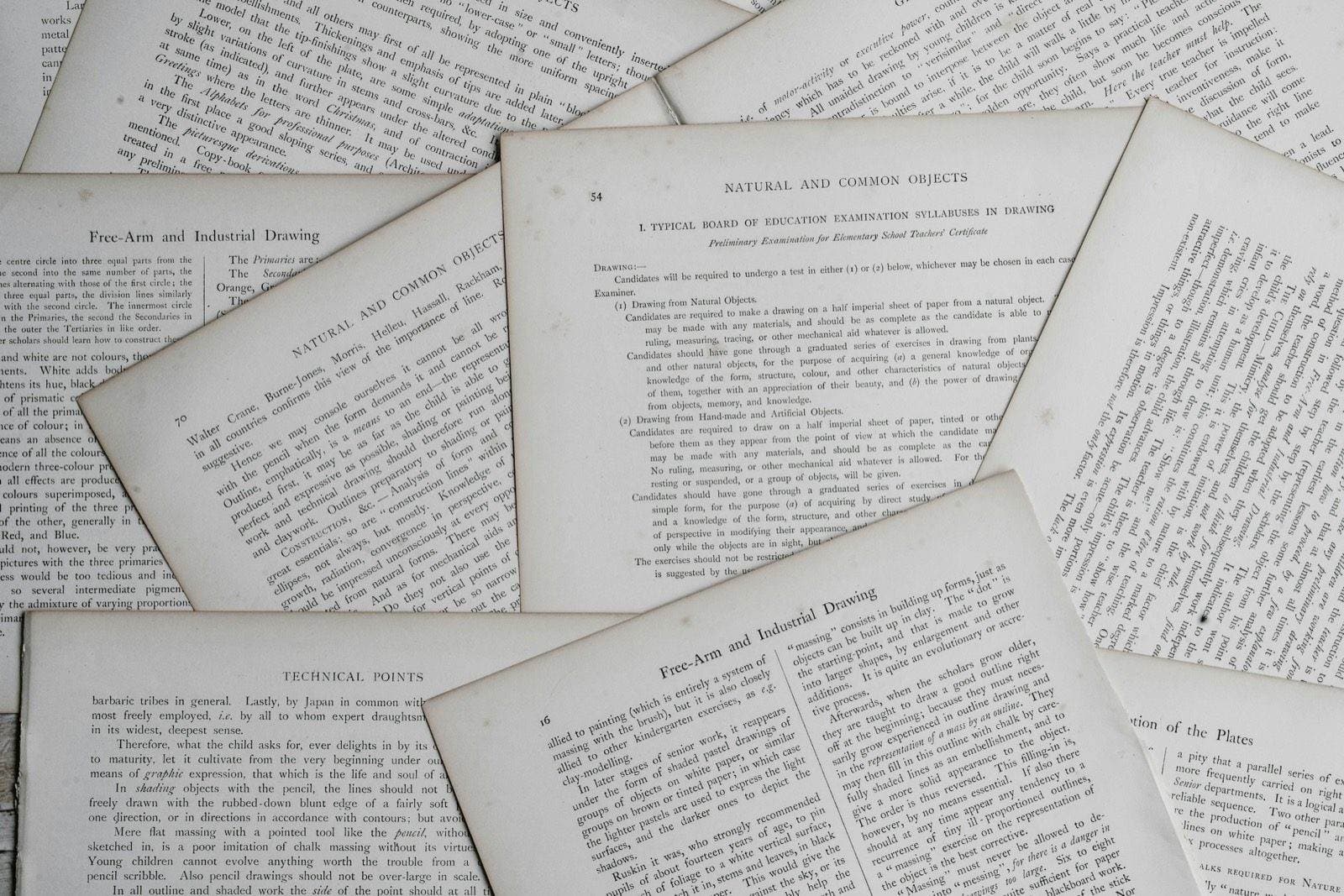 A loose stack of printed pages covered in dense typed text